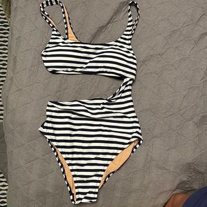 Cutout one-piece with stripes.
